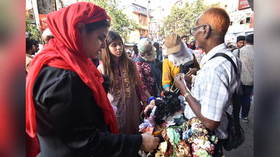 A shopper checks out some hair scrunchies