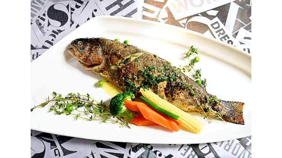 Butter Pepper Garlic Trout is made with tender baked trout drizzled with butter garlic sauce and served with sauteed vegetables.