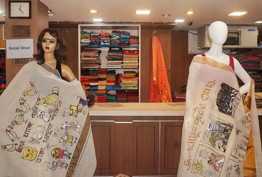 Mriganayani, a sari shop at Dakshinapan, launched its new collection with messages related to global warming and pet care     