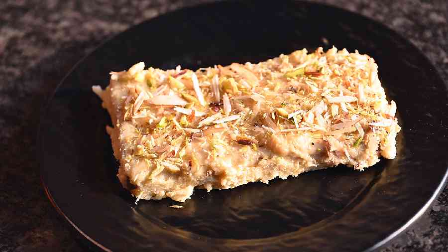 The royal Mughlai dessert Sahi Tukda where soft bread is soaked in warm saffron milk and sugar syrup and coated with almond shavings and pistachios is the best way to end your meal.