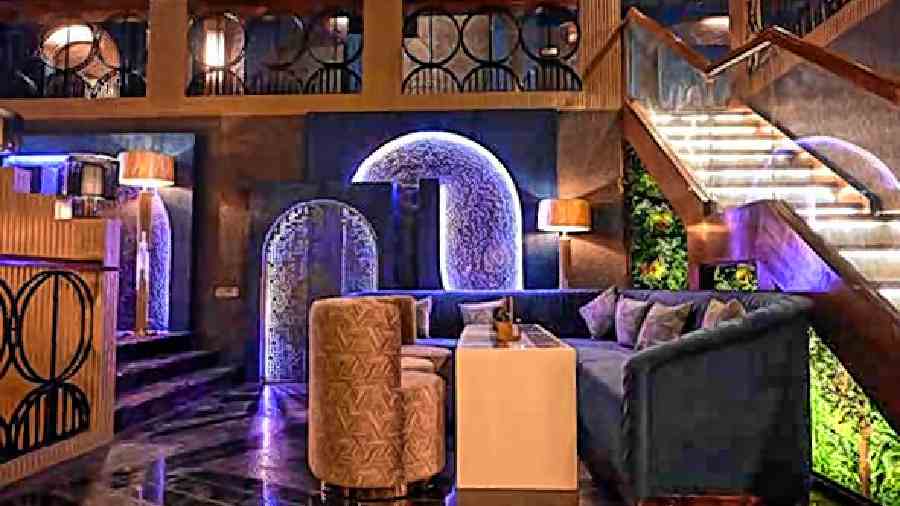 One of the VIP sections beautifully done up with snug couches with backlit arched walls makes this a hotspot in the club.