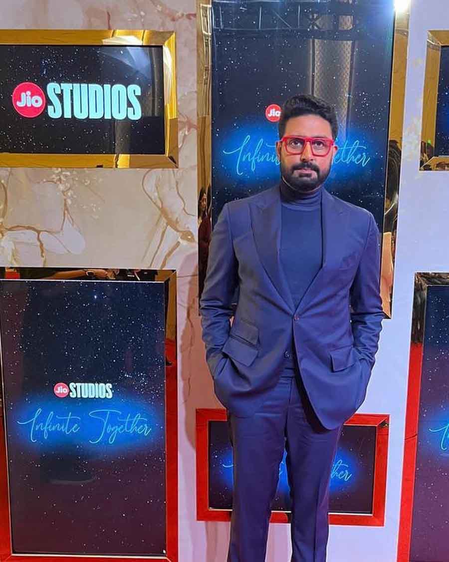 Abhishek Bachchan went for an all-blue look with a turtleneck and matching suit paired with red rimmed glasses. 
