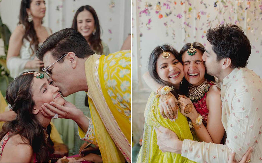Karan Johar, who launched Alia in Student of the Year in 2012, was one of the guests at the Mehendi. (Right) Alia’s sister Shaheen Bhatt and Brahmastra director Ayan Mukerji hug the happy bride. 