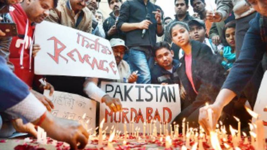 A candlelight tribute at the India Gate in 2019 to the CRPF soldiers killed in the Pulwama terror attack
