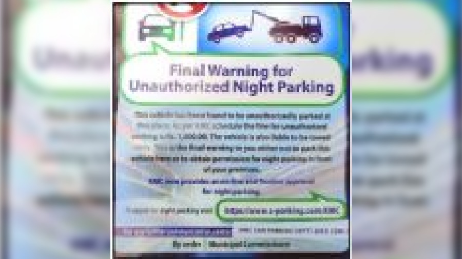 A poster that the Kolkata Municipal Corporation sticks on cars found illegally parked on roads at night