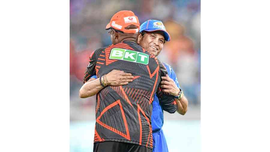 Legends Brian Lara and Sachin Tendulkar greet each other before Sunrisers Hyderabad’s match against Mumbai Indians on Tuesday