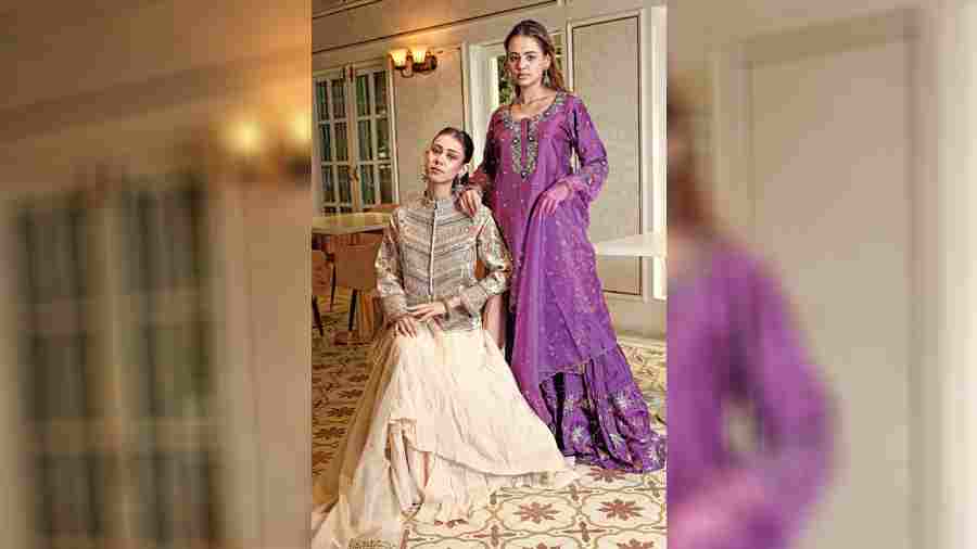 TRADITIONAL GLAM  Not looking to experiment much but still want to make a statement? The beautiful jewel-tone gharara with Benarasi trimmings is a stunner. The beige skirt with a jacket and its multicoloured embroidery make for a fun outfit without going overboard with cuts and silhouettes. Kulsum is seen wearing a regal purple gharara and kameez with intricate zardosi and coloured thread embroidery. The dupatta is an easy and light organza with a broad border on one side for draping. Simple antique gold earrings and chunky gold bangles complete the look. From colourful meenakari earrings to intricately detailed rainbow embroidery, Khusboo’s look is a mix of easy-to-wear with eye-catching details. The easy ponytail is a good way to focus on the statement jacket.
