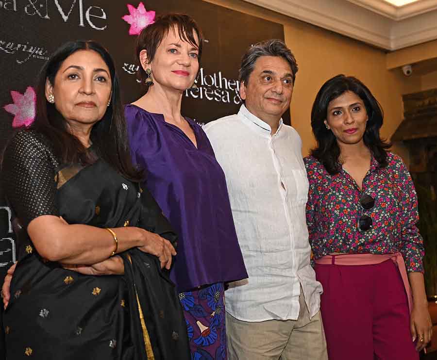 The director posed with the leading ladies after the trailer launch.