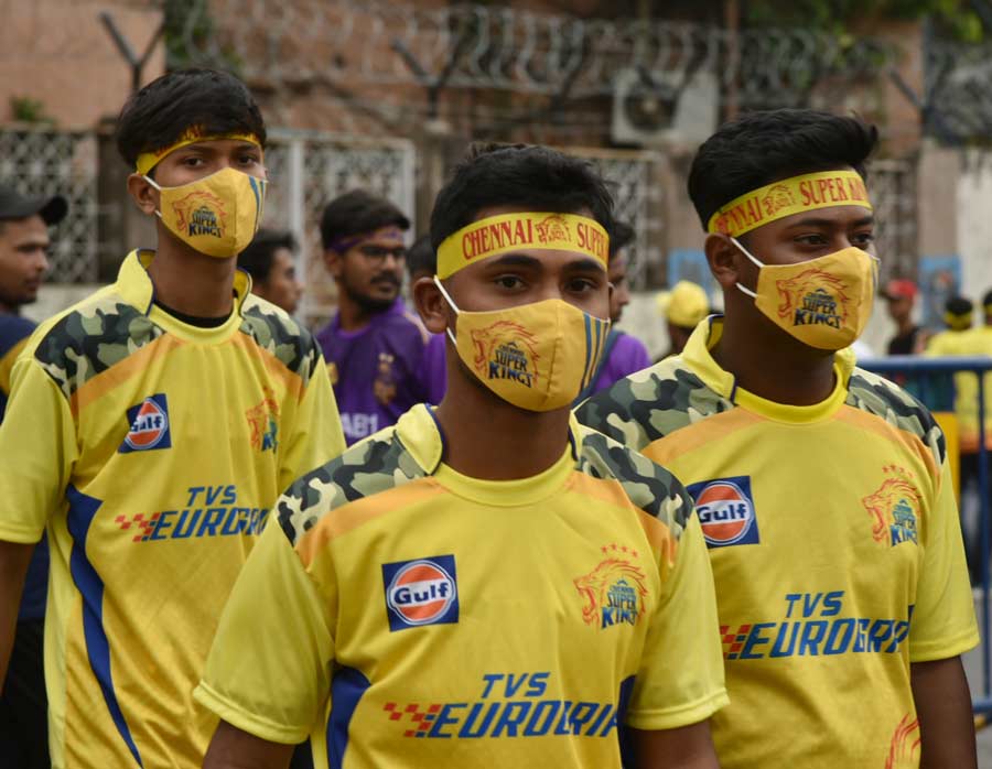 CSK fans play it safe with matching masks 