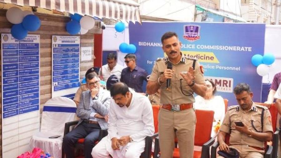 Fire and emergency services minister Sujit Bose (seated at the front) and Bidhannagar police commissioner Gaurav Sharma (standing) at the launch of the medical units on Saturday