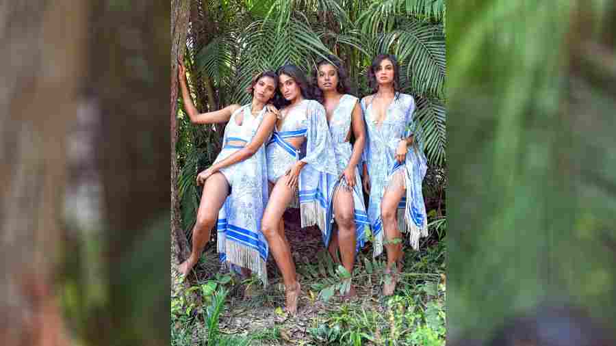 (L-R) Priyanka Das, Tanisha De, Megha Roy and Juhi are a picture of tranquil charm in these blue-and-white pieces with cover-ups.