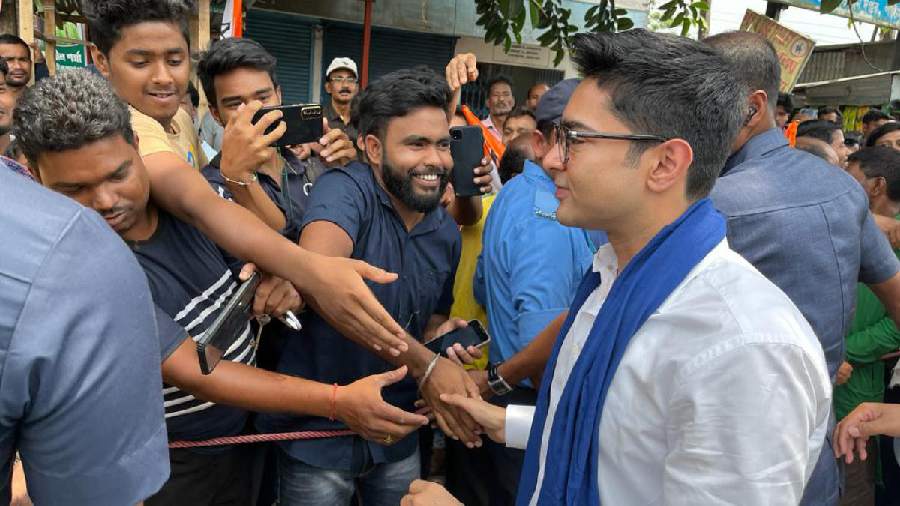 Abhishek Banerjee exchanges greetings with people on the second day of the outreach in Cooch Behar on Wednesday