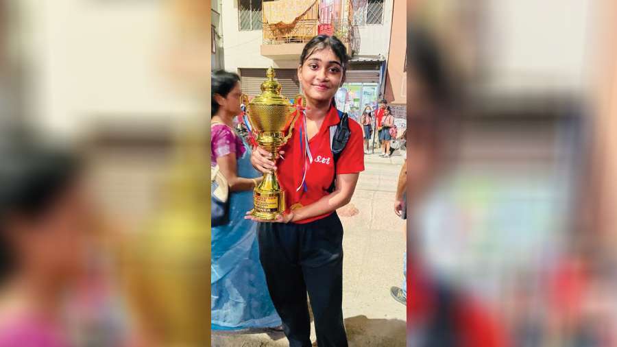 Ariha Das, captain of Team Australia, holds the SXI World Cup trophy for girls