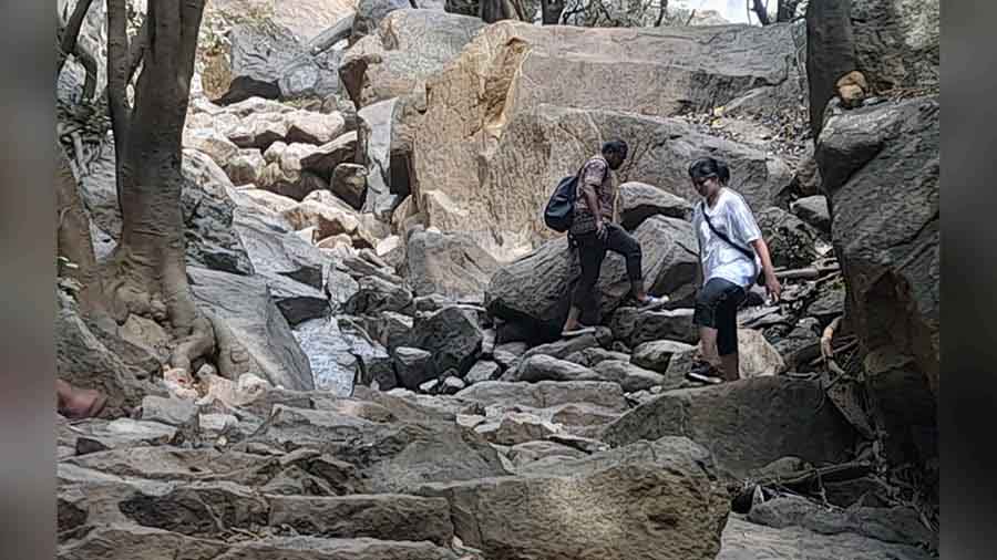 Approaching the Agaya Gangai Waterfalls through the boulder zone 