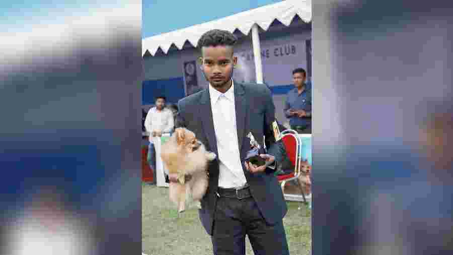 Shyamal Chakraborty strikes a pose with Chutki, his pet Pomeranian. Chutki won a prize as a second runner-up in the Best of Breed category. “Chutki has always been very lively and friendly with strangers. She is a good friend and loves to play with everyone,” added Shyamal.