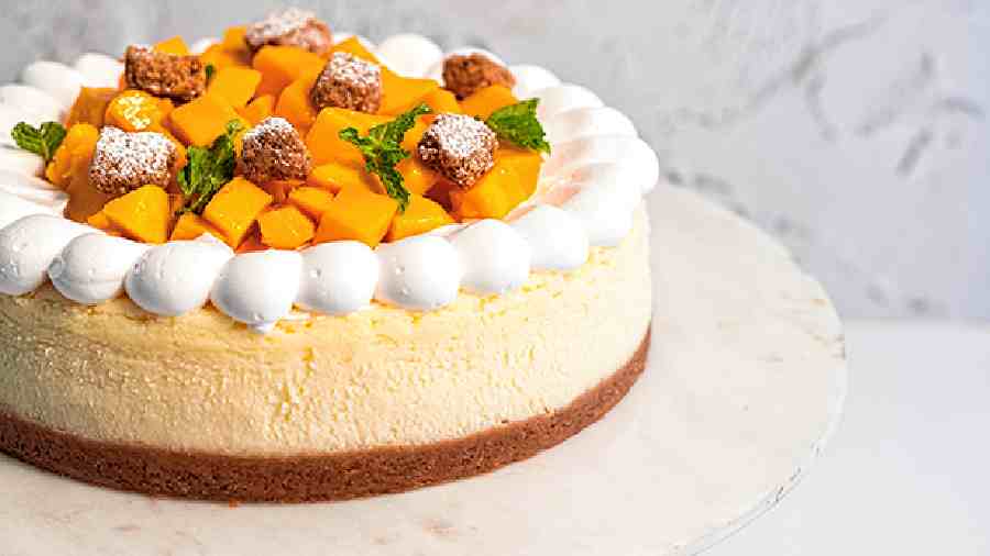 Alphonso Mango Cheesecake: New York baked Cheesecake topped with Alphonso mangoes, cream and crumble. You can also avail the eggless option. Rs 1,400 for 1 pound
