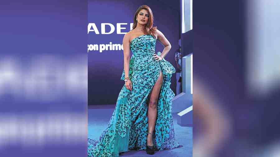 She stole the show at the Mumbai premiere of Citadel in a stunning blue tube gown from Versace that hugged her curves and featured a daring thigh-high slit. She completed her look with dramatic eye make-up and minimal accessories, her cascading locks taking care of the rest.