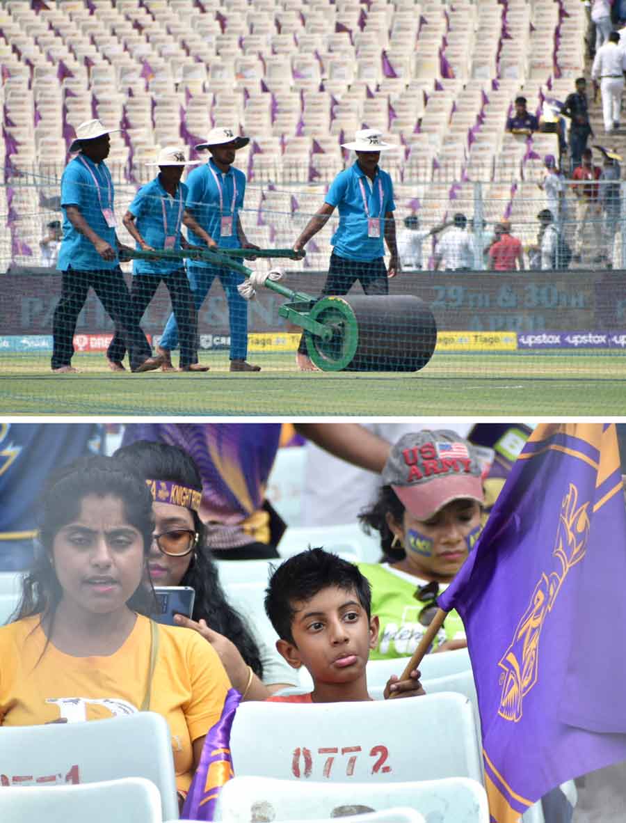 (Top) Groundsmen use the light roller around noon; (bottom) KKR fans are all set for the match. As the two sides face each other again, KKR, currently seventh in the standings, will be keen to get back their form while GT, on the other hand, are placed at the third spot and the team will try to win Saturday’s match to scale the ranking list