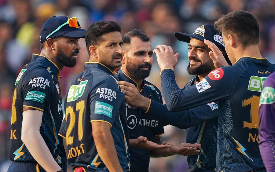 Gujarat Titans bowler Mohammed Shami celebrates with teammates after the wicket of Kolkata Knight Riders batter Narayan Jagadeesan. Ace speedster Mohd Shami took three wickets in four overs at an economy rate of 8.25
