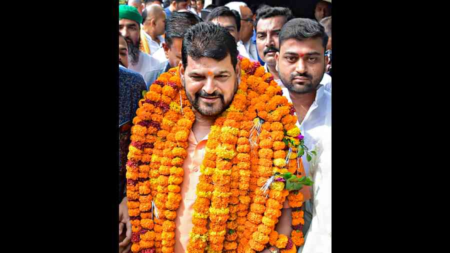 Wrestling Federation of India (WFI) chief Brij Bhushan Singh, whom the wrestlers have accused of sexual harassment of athletes, interacts with the media at his residence in Bishnoharpur village at Gonda on Saturday.