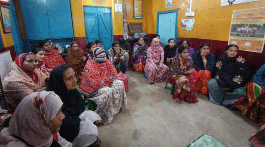 Mothers attend a session conducted by NGO Calcutta Rescue.