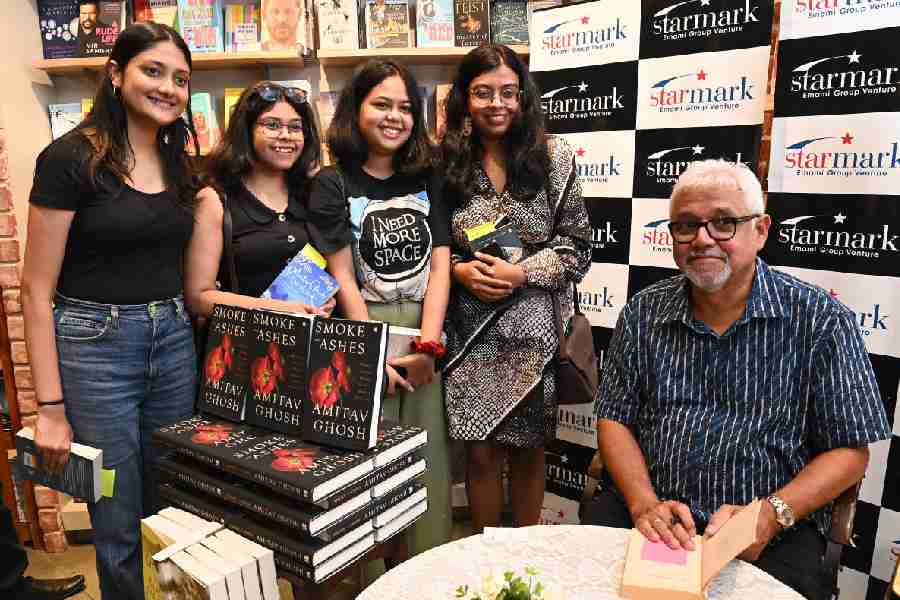 Young readers queue up to get their copies signed by Amitav Ghosh at Starmark, South City Mall