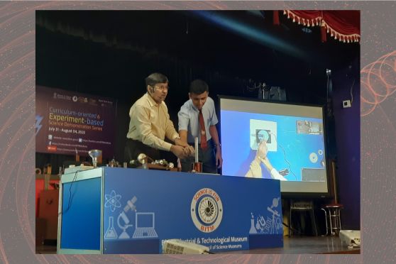 Dilip Ghosh, former Education Officer at BITM, involving students from the audience in the experiments he demonstrated on stage