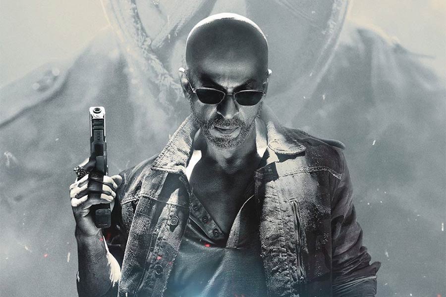 Jawan | Jawan's new poster shows a jacket-clad, bald Shah Rukh Khan holding  a gun - Telegraph India