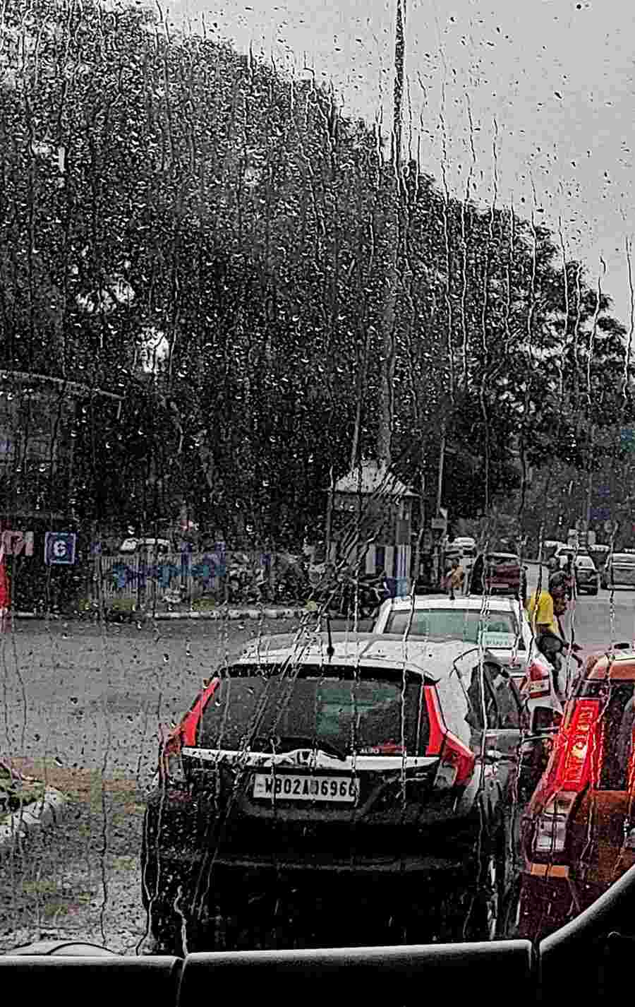 Light rain on the EM Bypass in Kolkata on Tuesday afternoon