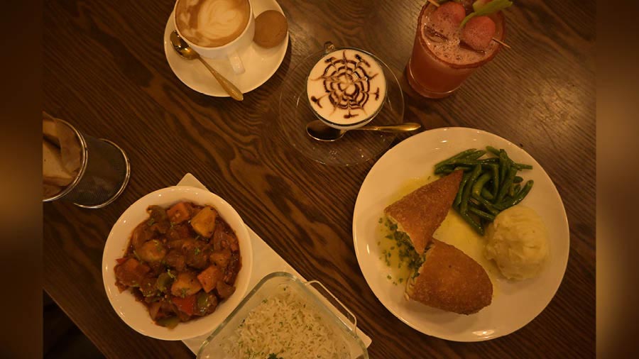 Lamb Goulash and Chicken Ala Kiev, Spicy Watermelon Cooler, cappuccino and hot chocolate.