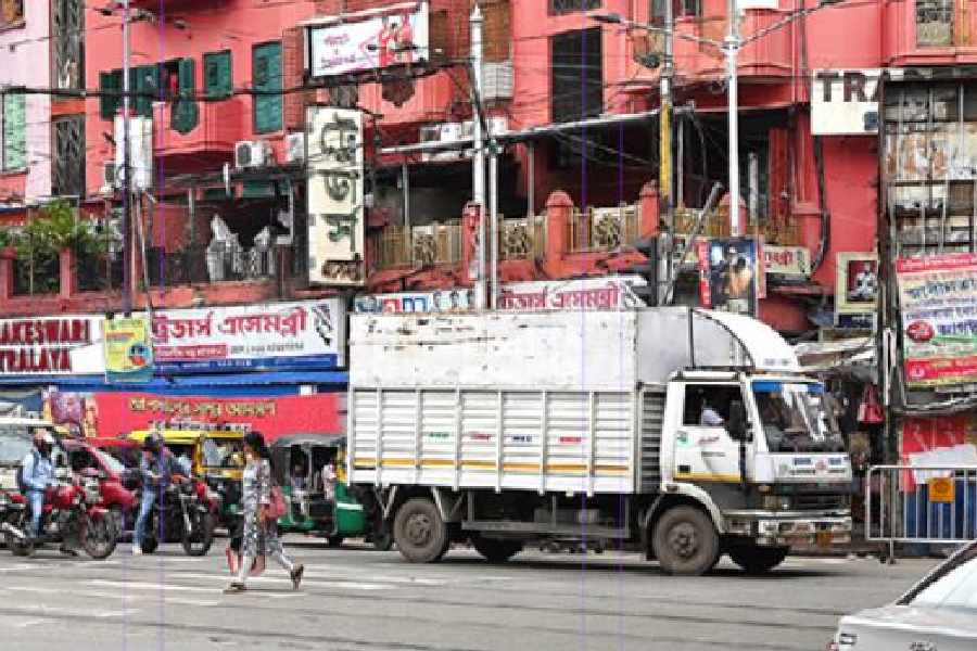 A goods vehicle stops on the zebra crossing on Rashbehari Avenue after the signal turned red at the Gariahat crossing on Wednesday.