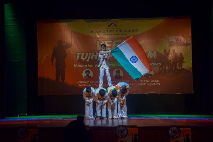 Students of Birla High School present a dance on patriotism