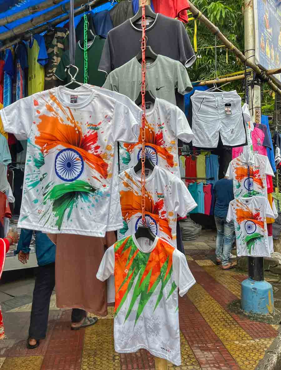 Tricolour T-shirts on sale in front of the Maidan Market at Esplanade on Thursday