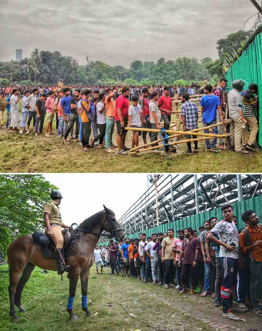 (Top) Hundreds of people queue up near Mohun Bagan ground on the Maidan on Thursday afternoon for tickets to the Durand Cup derby between Mohun Bagan and East Bengal match on Saturday and (above) a member of the mounted police stands guard