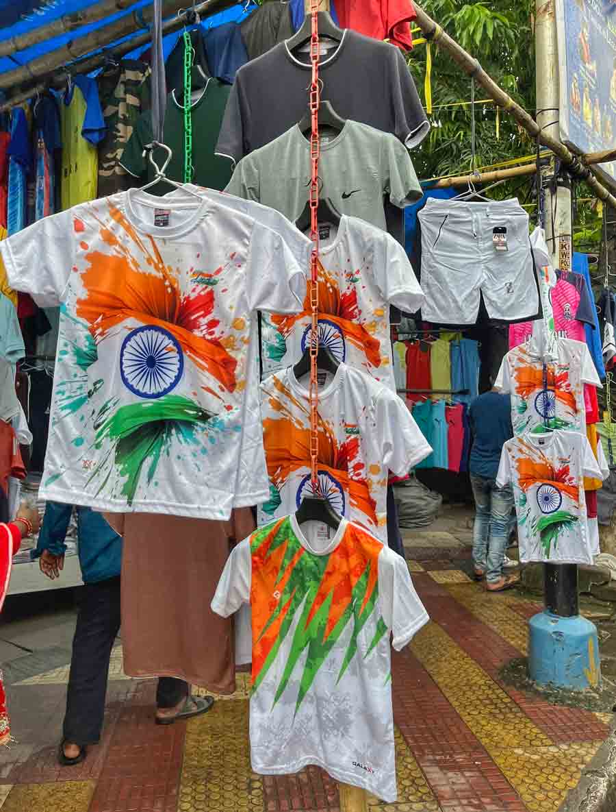 Tricolour T-shirts on sale in front of the Maidan Market at Esplanade on Thursday  