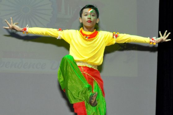 The event encompassed a flag hoisting ceremony, cultural presentations, and the acknowledgment of exceptional students