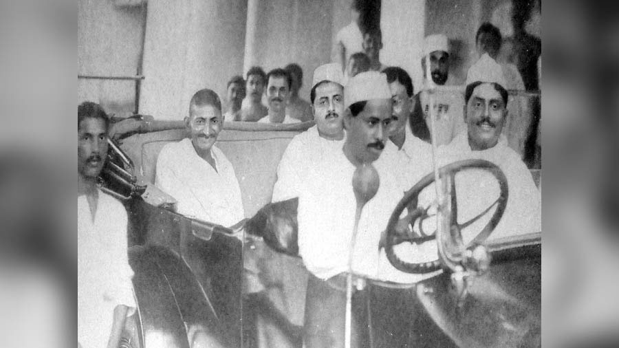 Mahatma Gandhi with Bijay Krishna Khan, son of Raja Narendra Lal Khan on his way to Narajole Rajbari
