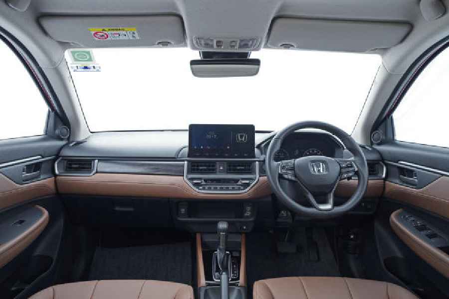 The dashboard with its smallish by current standards infotainment screen and straight lines looks a tad dated, but there is a sense of quality about the wood and leather