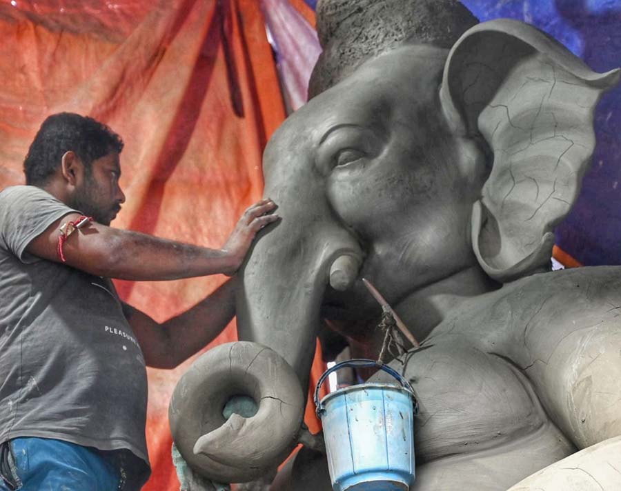 An artisan works on a Ganesh idol in Kumartuli ahead of Ganesh Chaturthi, which falls on September 19 this year   