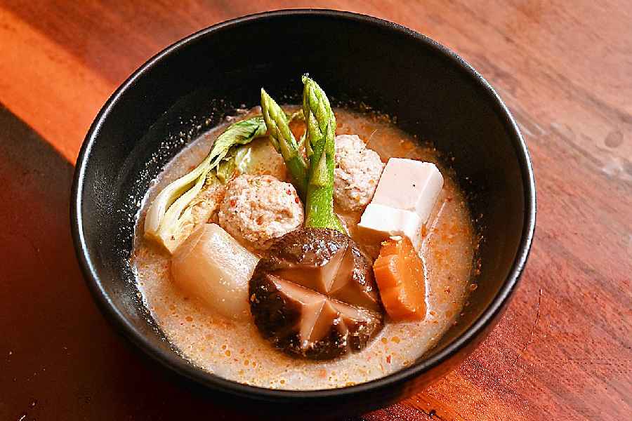 Nikudango is a warm soup with chicken meatballs, tofu, scallion and Shimeji cabbage