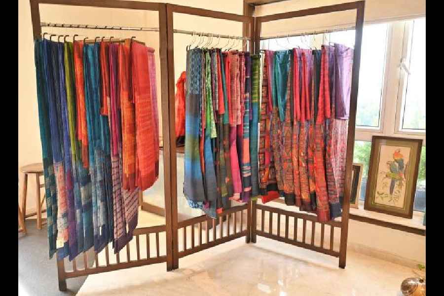 Collection of saris and suits