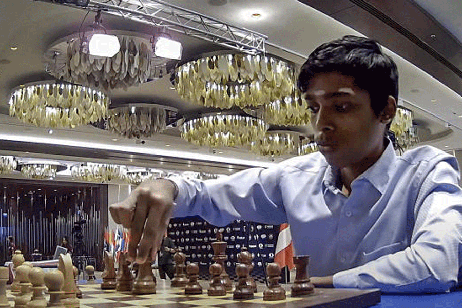 World chess champion Viswanathan Anand of India holds a trophy at an award  presentation ceremony of the FIDE World Chess Championship in Moscow,  Russia, Thursday, May 31, 2012. Anand oretained his title