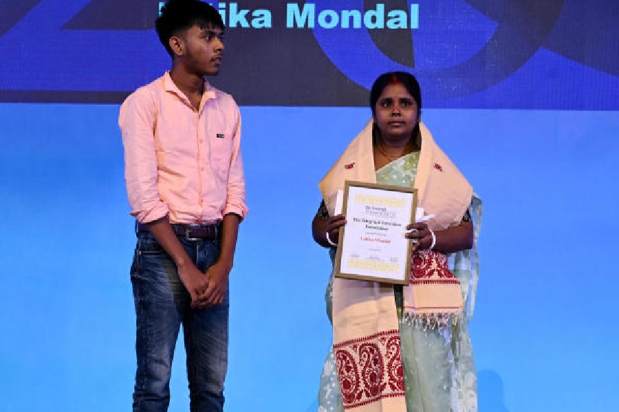 Latika Mondal and her son Sourabh. Latika received The Telegraph Education Foundation honour on Saturday