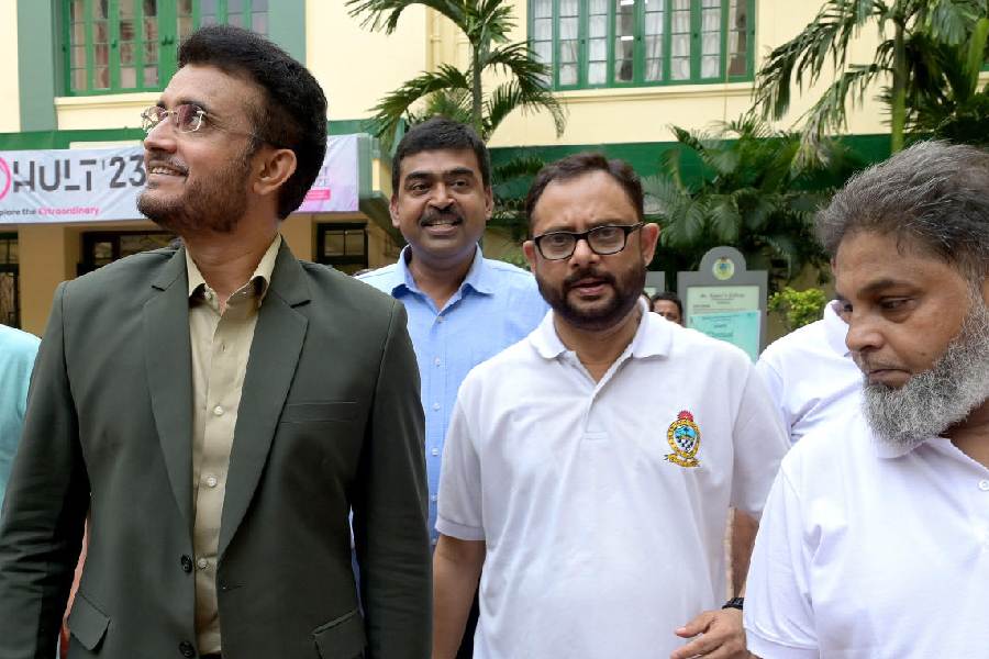 Sourav taking a stroll on the campus with SXCCAA honorary secretary Firdausul Hasan