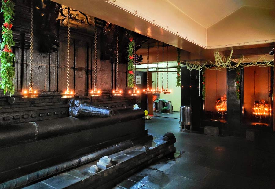 Traditional brass oil lamps light up the interiors of the Sree Guruvayurappan Temple 