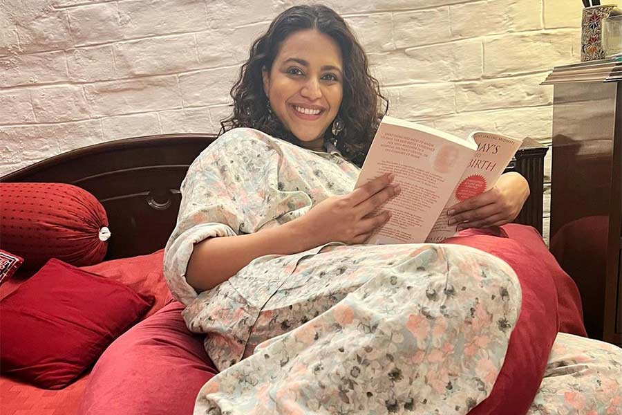 Swara also shared pictures in which she was seen relaxing with a pregnancy pillow set — a U-shaped pillow, a sleeping mask and a contour pillow around the neck. She held a pregnancy guide book in her hand.