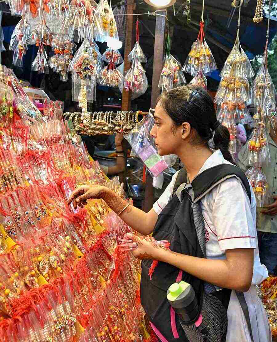 On the eve of Rakhi Purnima, people were seen buying rakhis across the city on Tuesday  