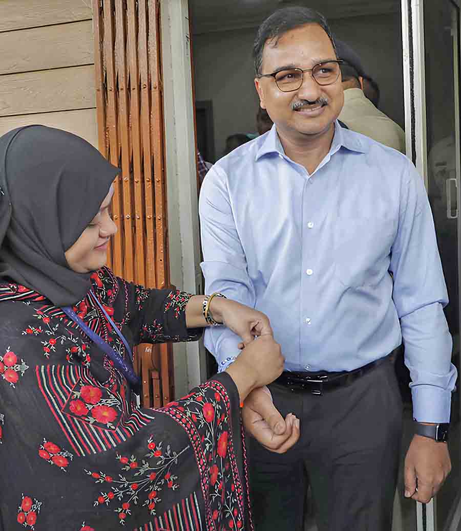 Kolkata police commissioner Vineet Kumar Goyal attended the Raksha Bandhan Utsav held in front of Metro Channel outpost of Hare Street police station at Esplanade on Wednesday  