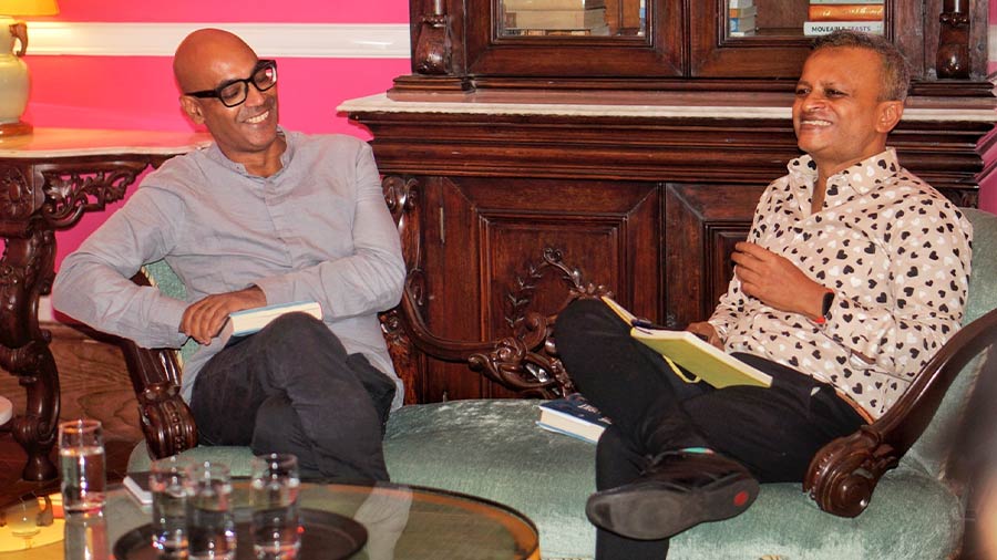 Siddhartha Deb (left) and Sandip Roy at the Glenburn Penthouse, in conversation about Deb’s new novel, ‘The Light at the End of the World’