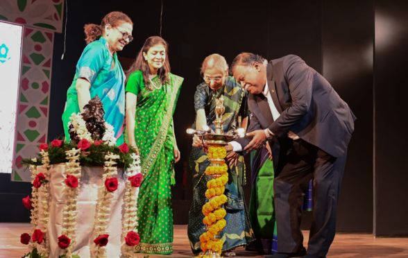 Dr Debprosad Duari, the Chief Guest of the event lighting the inaugural lamp